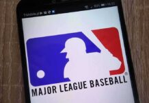 MLB Playoffs Hit With ‘Soft Porn’ Uproar Major League Baseball logo on a smartphone screen