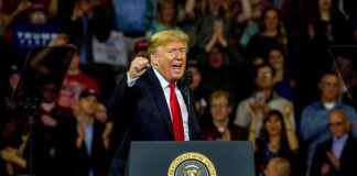 Trump Gets Brutally Honest With Rally Crowd Donald Trump speaking at a rally behind a presidential podium