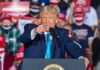 NBA Icon Spotted at Raucous Trump Rally speaker pointing during a rally