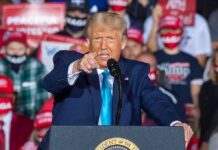 NBA Icon Spotted at Raucous Trump Rally speaker pointing during a rally