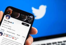 Smartphone displaying a social media profile on Twitter app