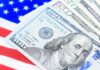 us dollar bills on american flag background