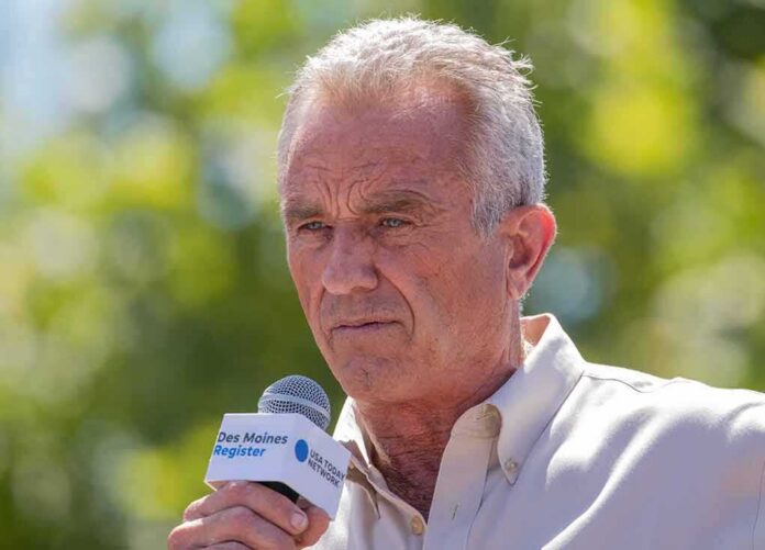 Man speaking into a microphone outdoors