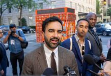 NYC First Lady Tied To Israel-Abolish Push Zohran Mamdani speaking to reporters on a city sidewalk