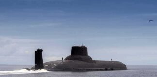 Anduril LandBillion-Dollar Submarine Bet Submarine cruising on calm sea